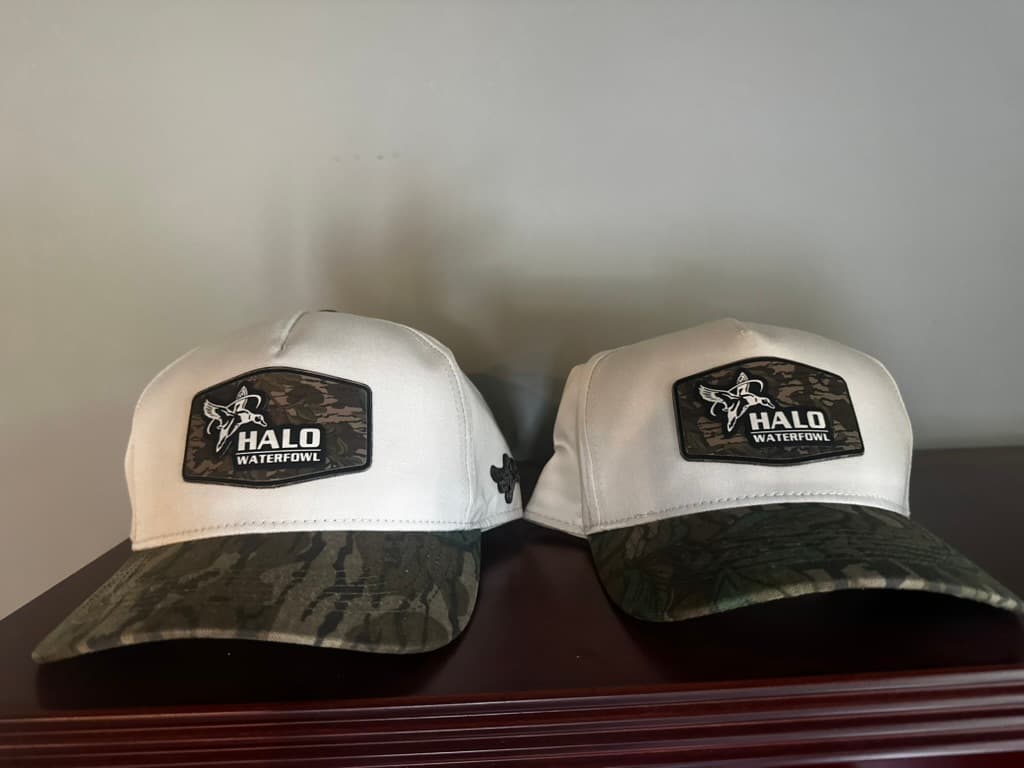 Two stone hats with camo woven patches